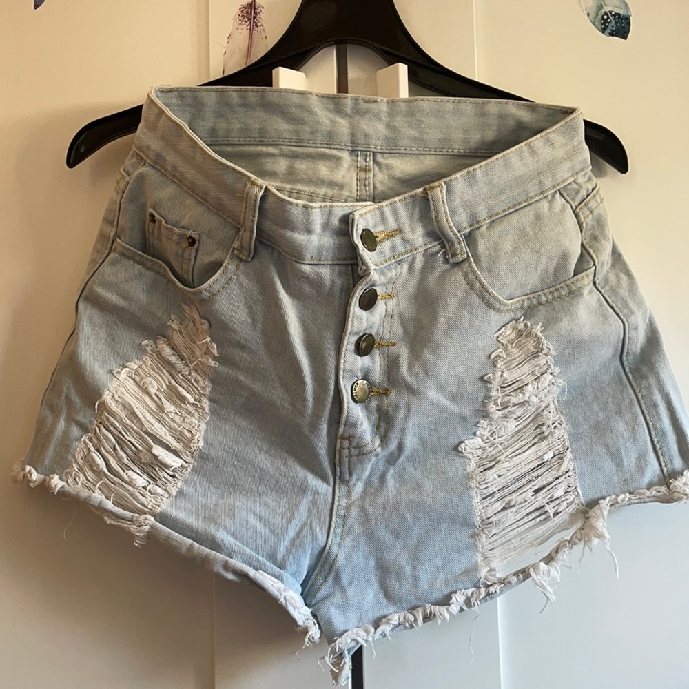 Ripped raw hem bottom fly denim shorts
